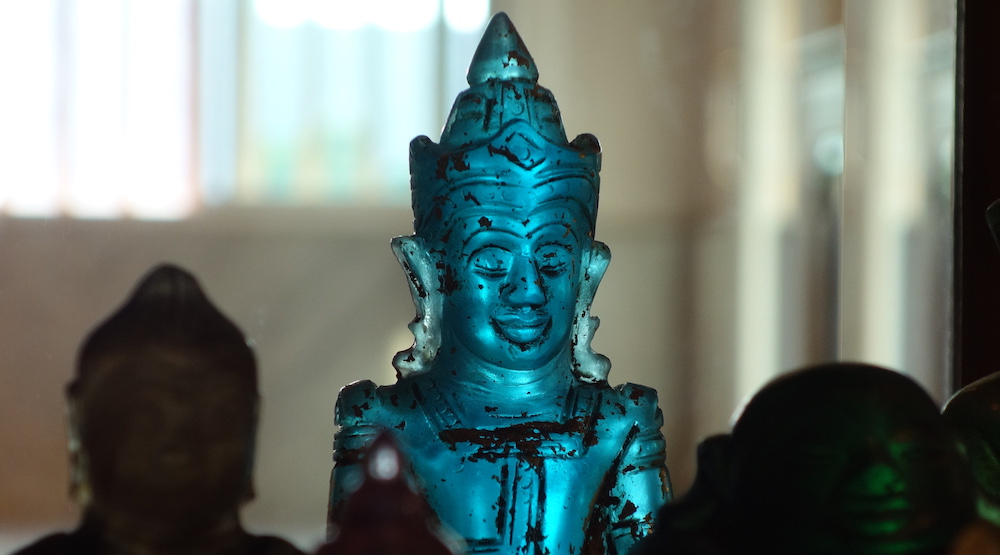 One of the statuettes in collection in Wat Paknam museum